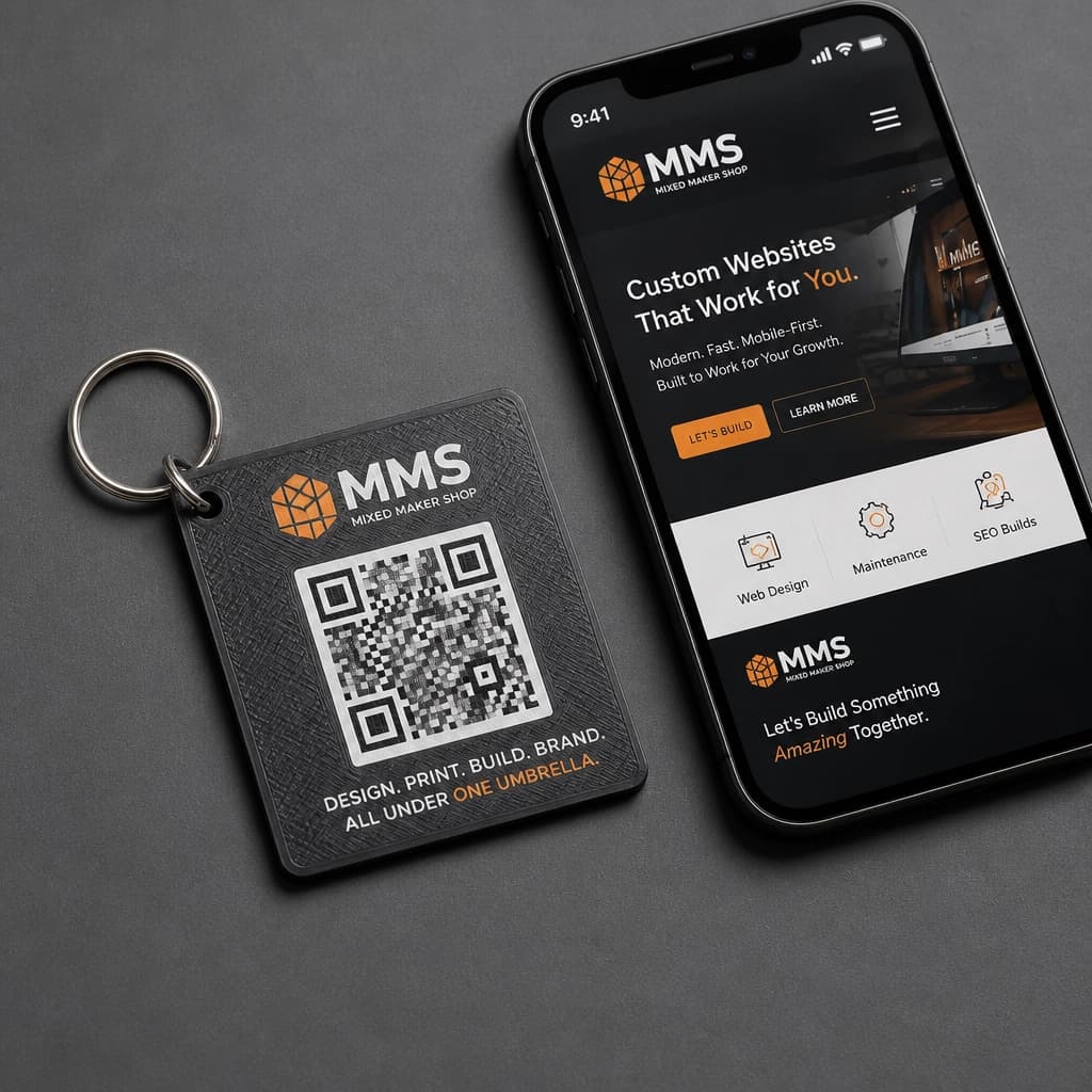 Close-up of a 3D printed keychain with an embedded QR code